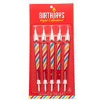 The BirthJays 5 Pack contains 5 BirthJay Cone Candles on a Red Gifting Card with a plastic blister mold protecting the BirthJays. A BirthJay is a colorful 98mm cone with a shiny crutch wrap, a candle topper that features a real 2cm candle that will burn for 10-25 seconds and mote to catch dripping wax, and a cake stake that you will slide the bottom of the cone into, so you avoid food in the filter of the cone. These are the perfect gift to elevate special occasions!